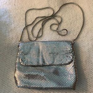 Valerie Stevens shiny silver cross body bag.